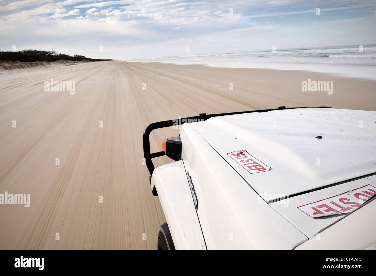 Self drive tour on Fraser Island along beach, offroad vehicle, UNESCO world herritage site, Queensland, Australia Stock Photo