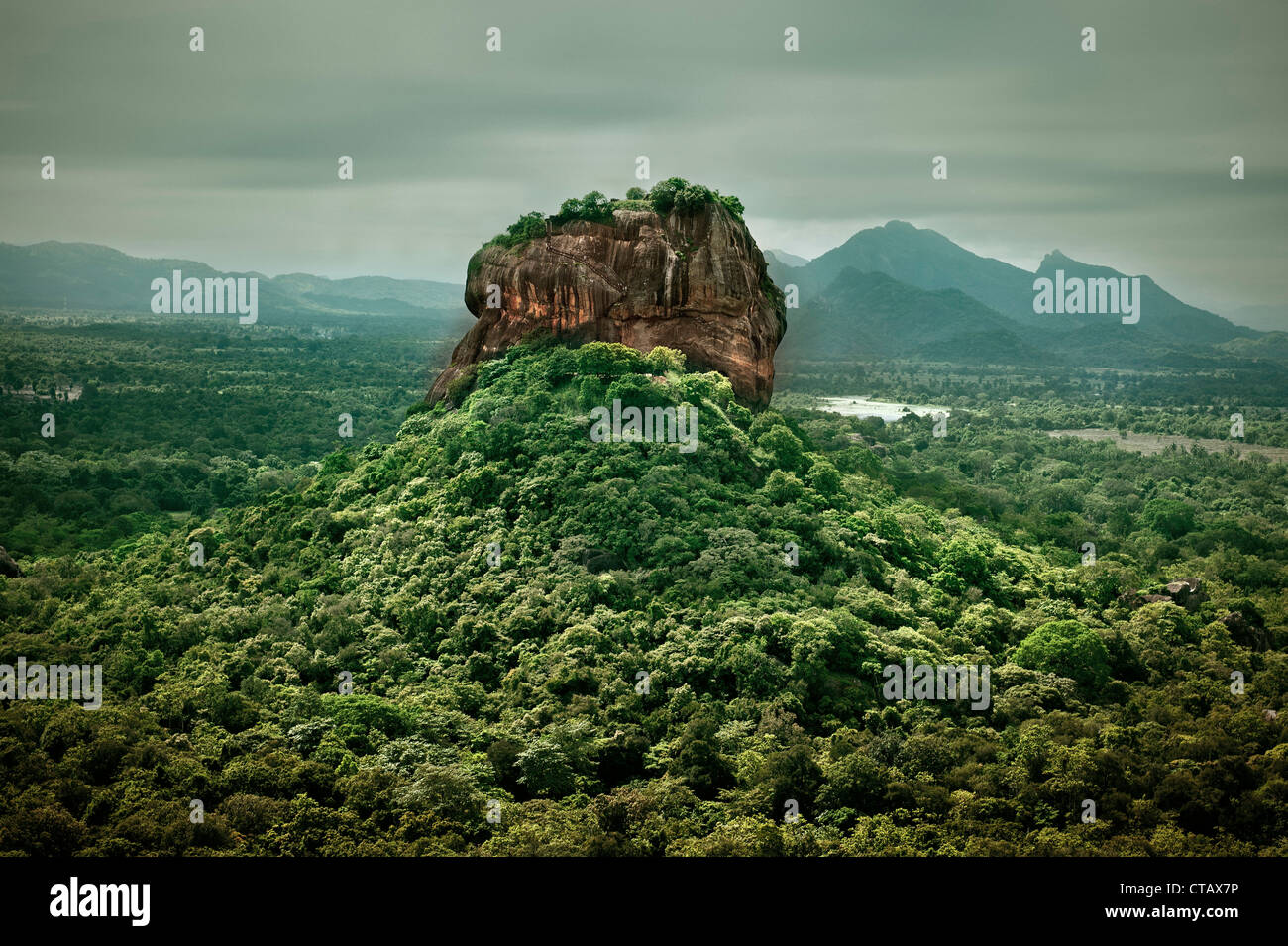 Sigiriya rock fortress rises straight out ot the jungle, cultural triangle, Sri Lanka, UNSCEO world herritage Stock Photo