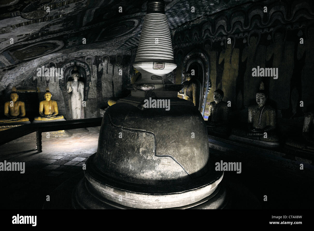 Buddha statues and stupa at rock caves of Dambulla, cultural triangle, Sri Lanka, UNESCO world herritage Stock Photo
