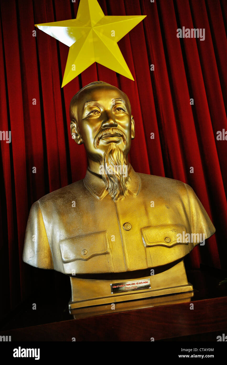 Sculpture of Uncle Ho in front of Vietnamese Flag at Reunification Palace, Saigon, Ho Chi Minh City, Vietnam Stock Photo