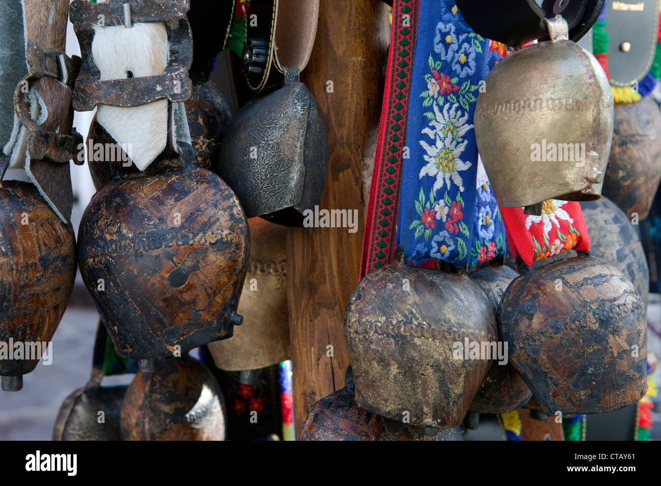 Traditional cow bells at a souvenir shop, Mittenwald, Upper Bavaria, Bavaria, Germany Stock Photo