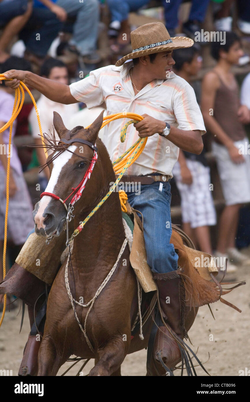 Cowboy with lasso in bull ring in Santa Cruz, Guanacaste, Costa Rica as part of Guanacaste Day celebrations – 25th July. Stock Photo