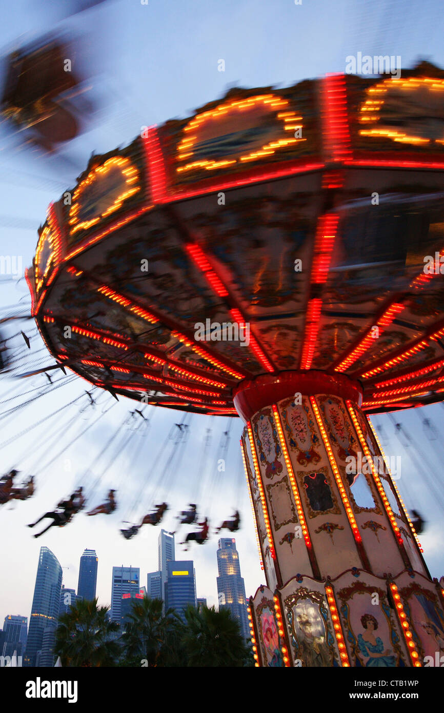 Carrousel in front of Singapore Skyline, Singapore, Asia Stock Photo