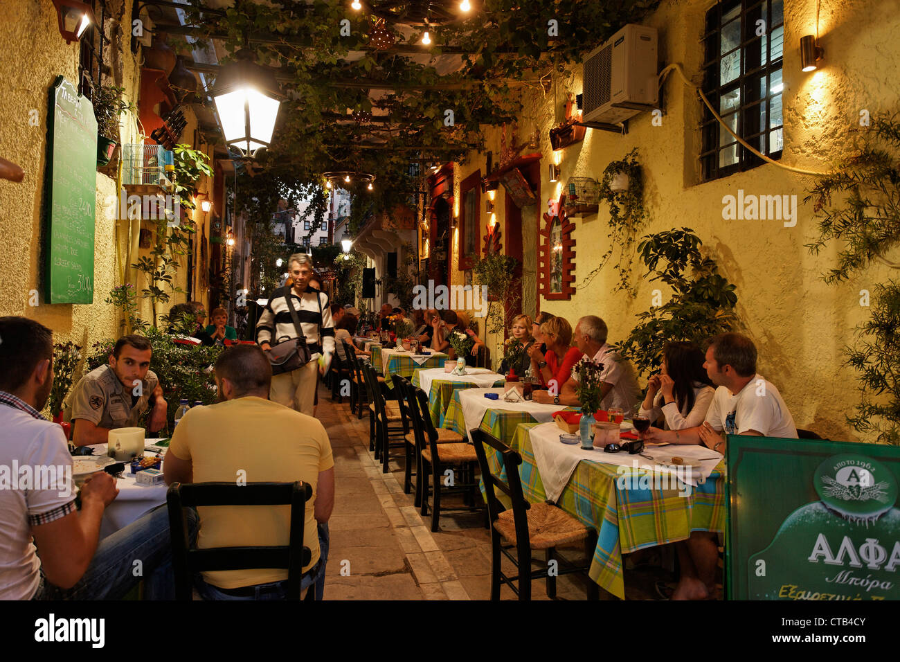 Restaurants in a lane, old town, Rethymnon, Crete, Greece Stock Photo