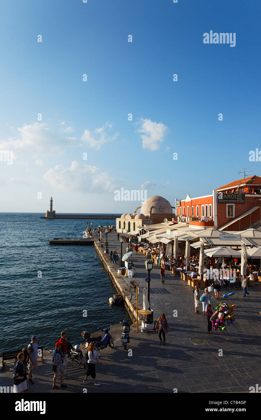 Restaurants, Turkish Mosque Yiali Tzami, Venetian port, Chania, Crete, Greece Stock Photo