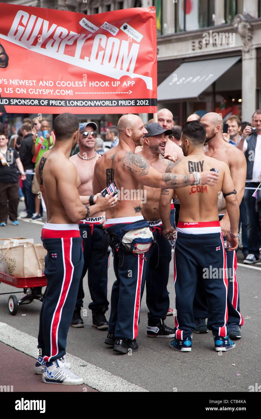 Topless group of men at World Pride in London - 7 July 2012 Stock Photo