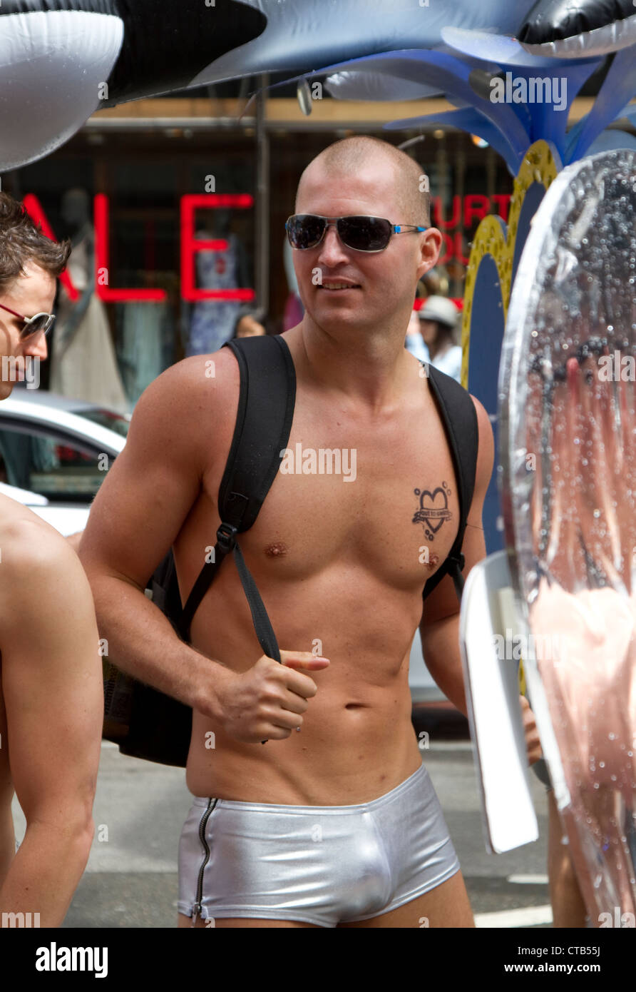 Topless handsome man at World Pride in London - 7 July 2012 Stock Photo