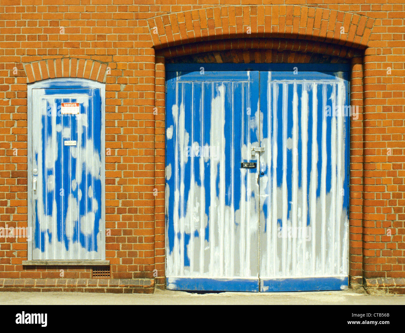 Garage double doors with undercoat paint, Wiltshire, UK Stock Photo Alamy