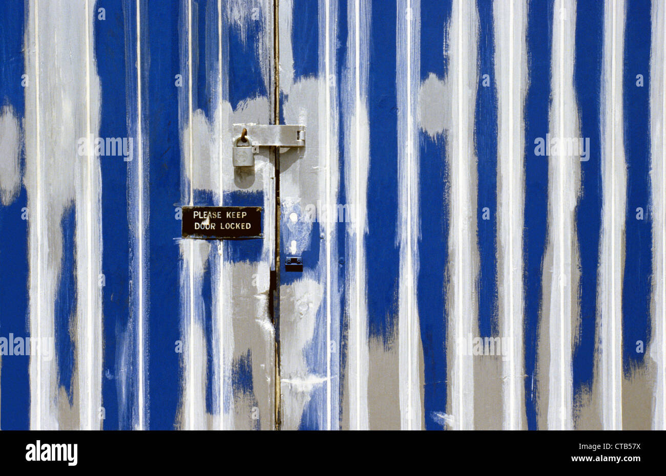 Garage double doors with undercoat paint, Wiltshire, UK Stock Photo Alamy