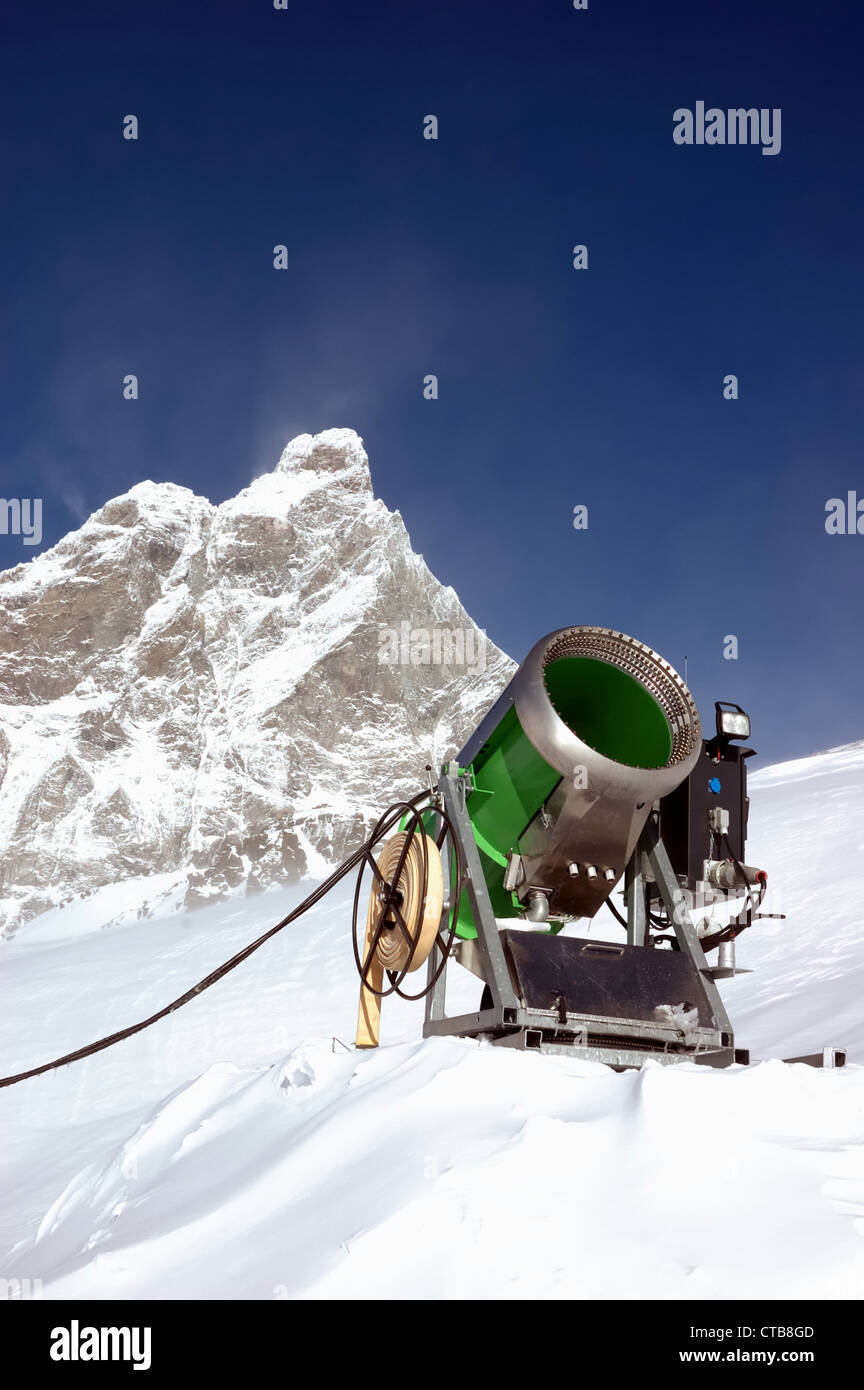 Snowmaking snow gun next to ski piste, d, Stock Video