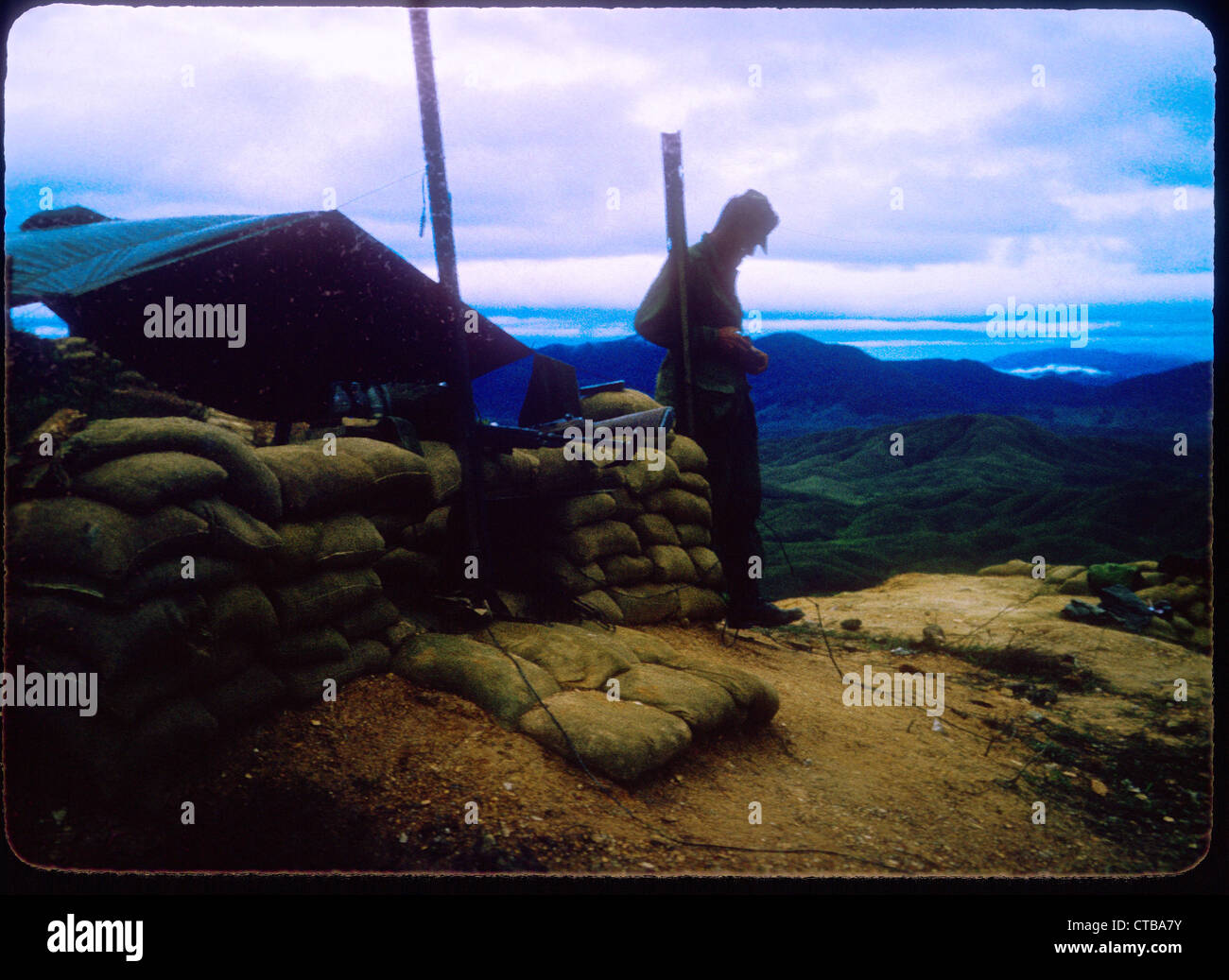 infantryman standing next to sand bags US Marines Vietnam War 1965 Stock Photo