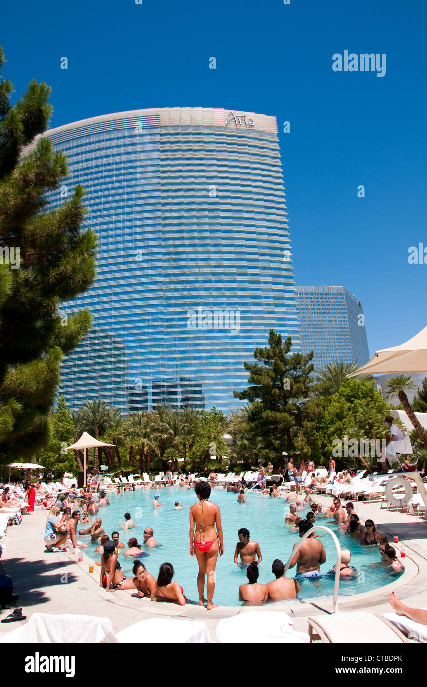 USA Las Vegas, Aria resort on the Strip, with its emphasis on design and outdoor pools. People enjoying the pools. Stock Photo