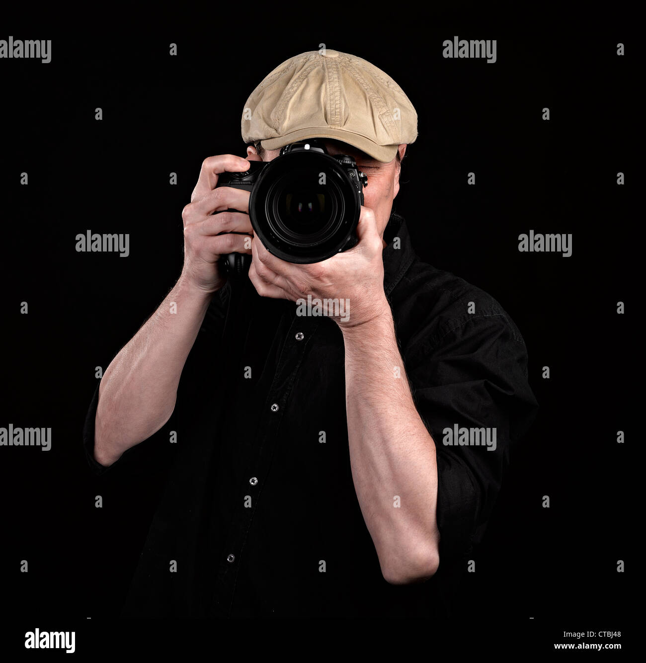 A photographer with a nice camera on black background Stock Photo Alamy