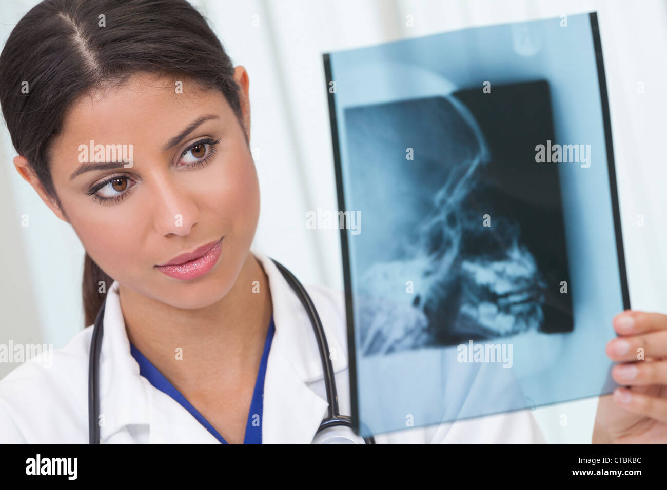 Female woman medical doctor holding x-ray in hospital Stock Photo