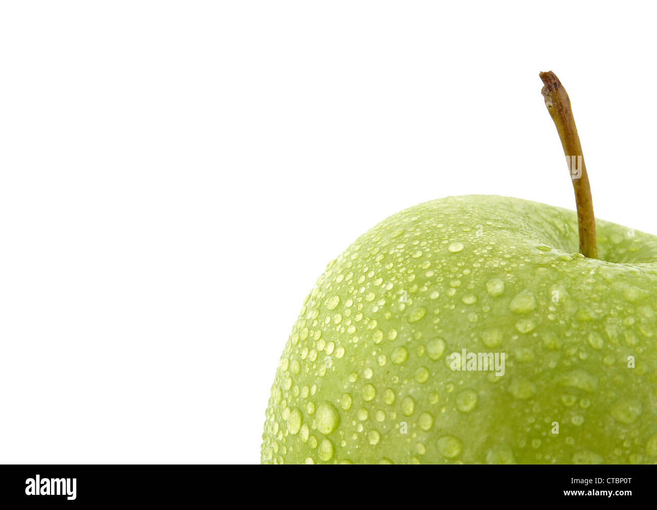 Green apple with water drops Stock Photo