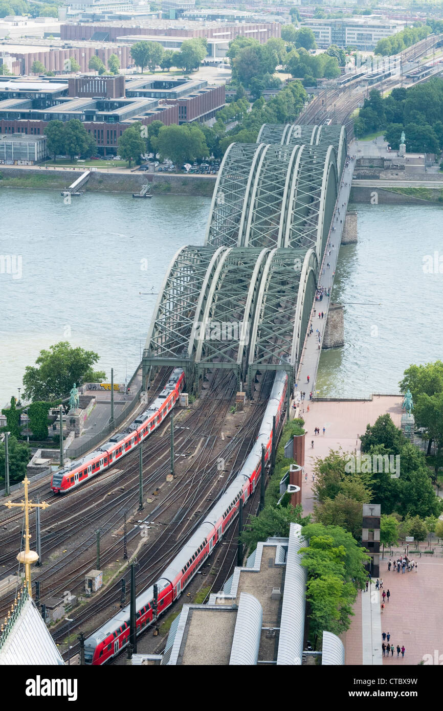 View from above of Hohenzollern Bridge across River Rhine at railway station in Cologne Germany Stock Photo