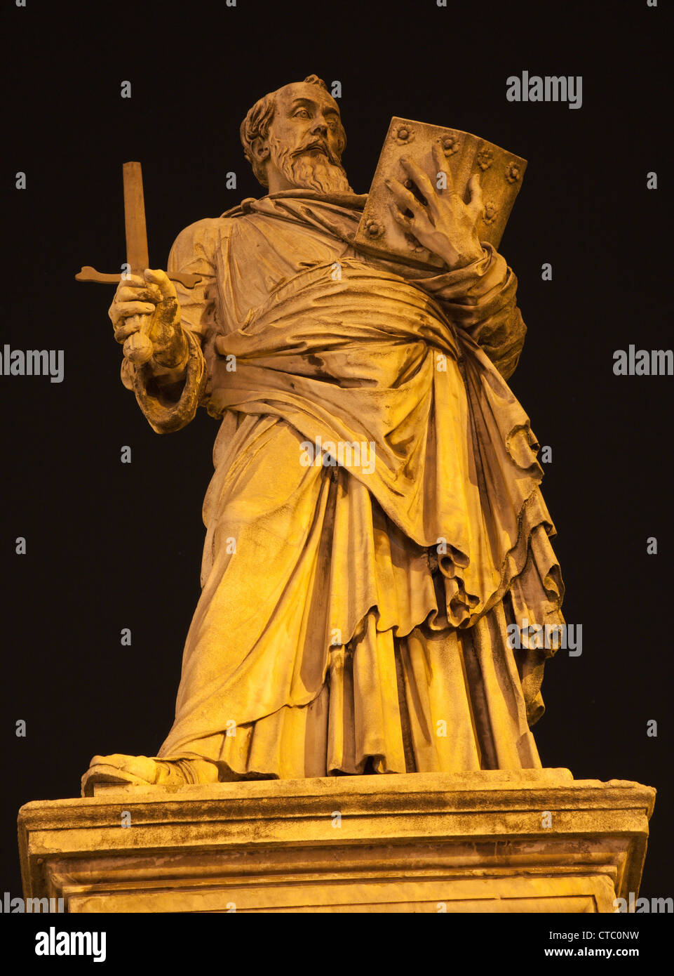 Rome - statue of St. Paul on the Angels bridge at night  Paolo Romano from 15. cent. Stock Photo
