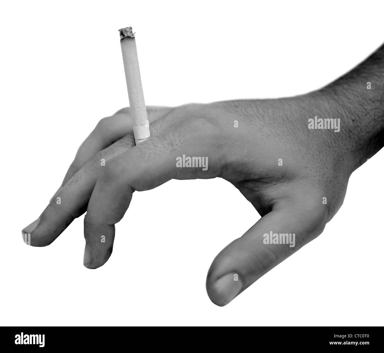Human hand holding cigarette in black and white Stock Photo