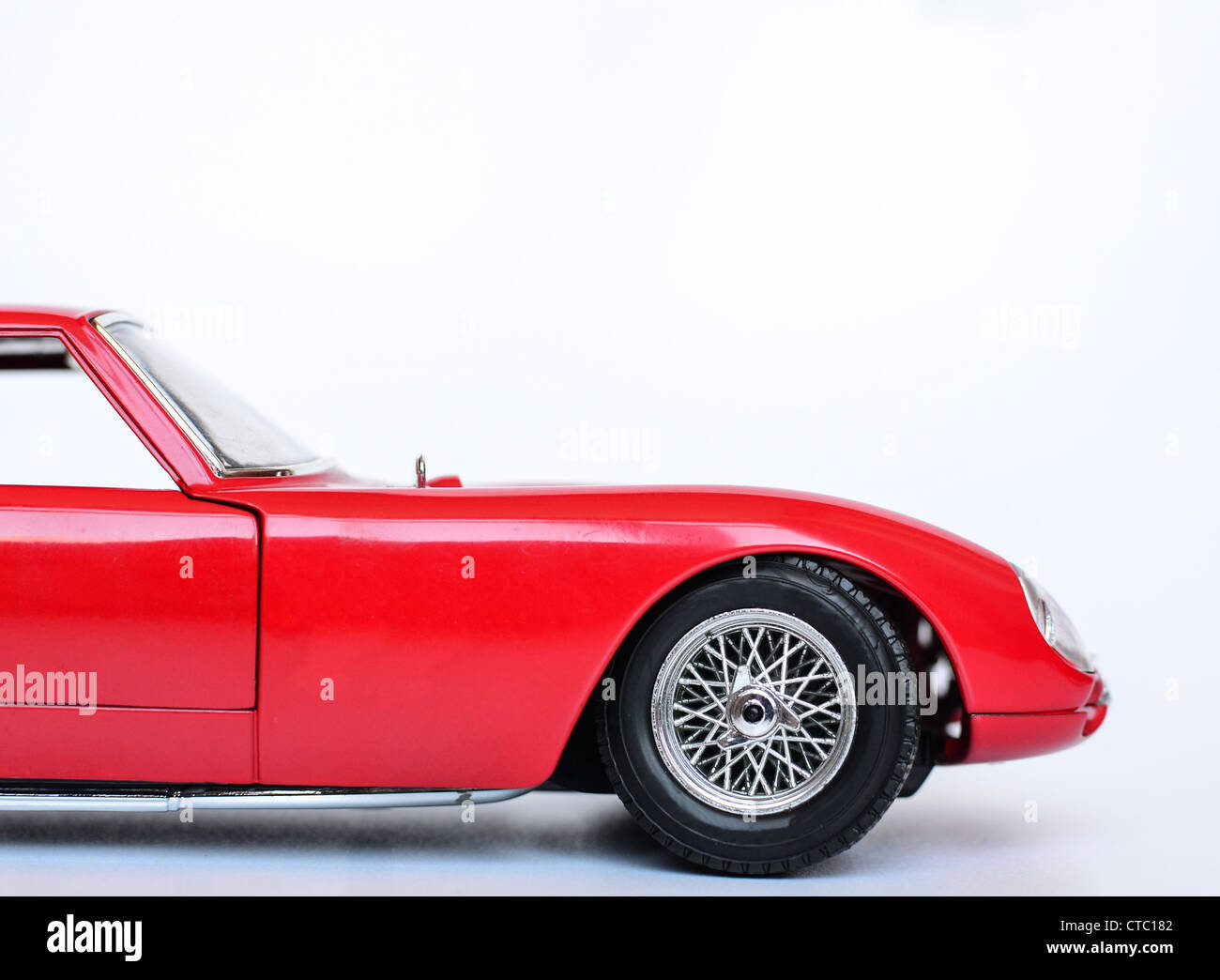 Red sports car toy isolated on white Stock Photo Alamy