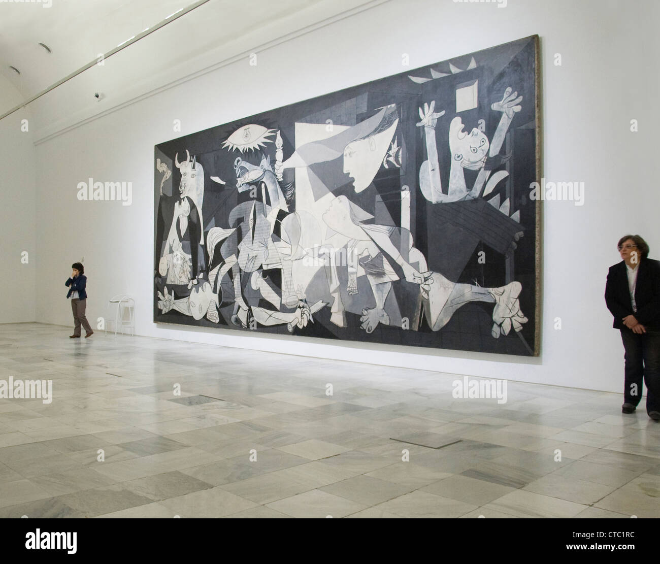 Anti war painting Guernica by Pablo Picasso hanging at the Museo Nacional Centro de Arte Reina Sofía in Madrid Spain Stock Photo