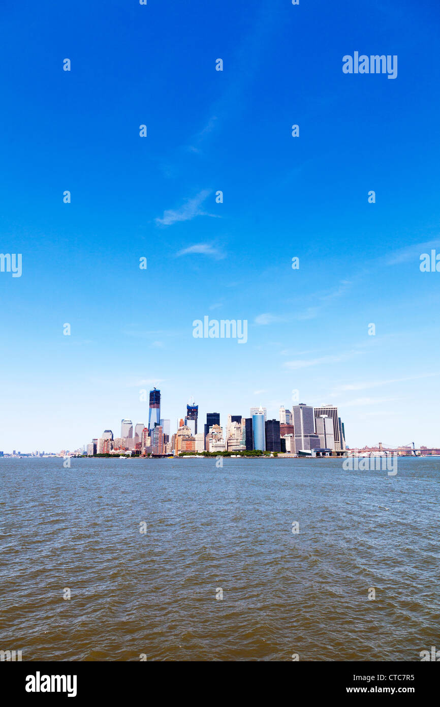 Cityscape skyline of Lower Downtown Manhattan, New York City from ferry inc Freedom Tower, Stock Photo
