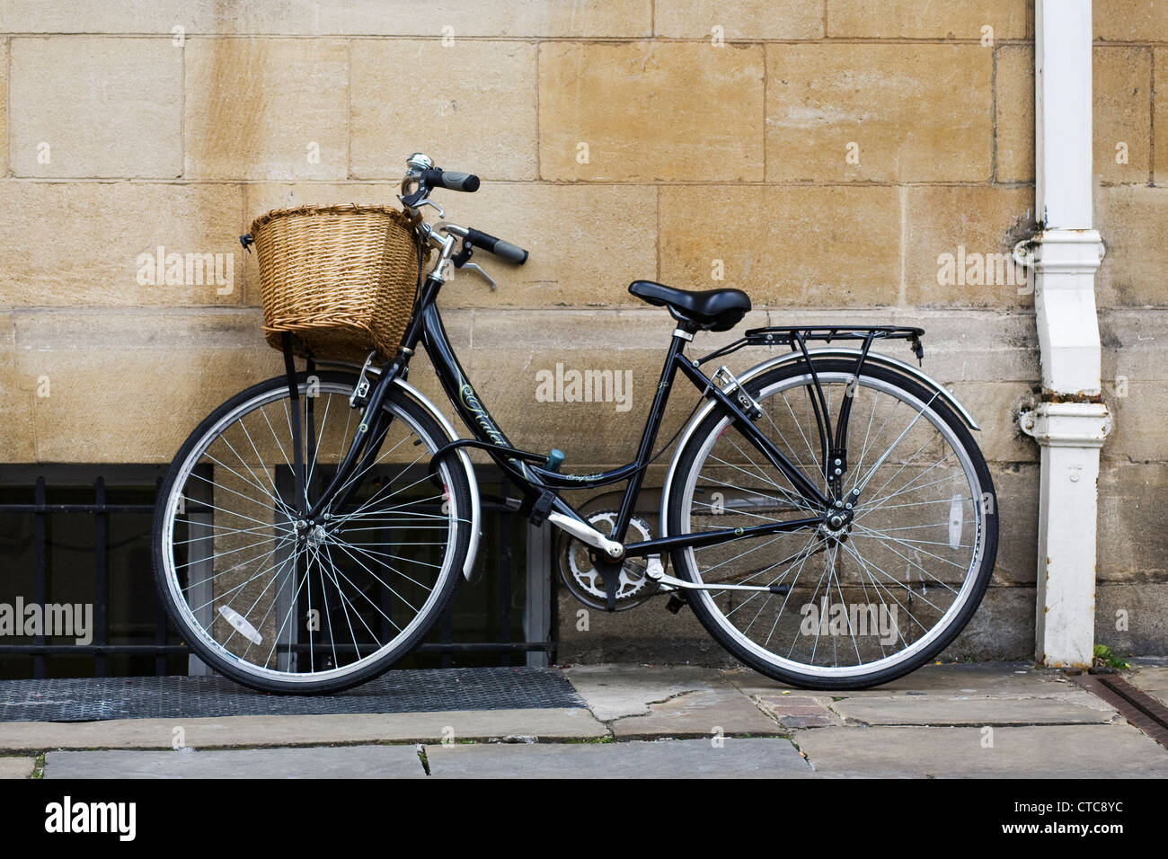 A Raleigh bicycle standing against a wall. Stock Photo