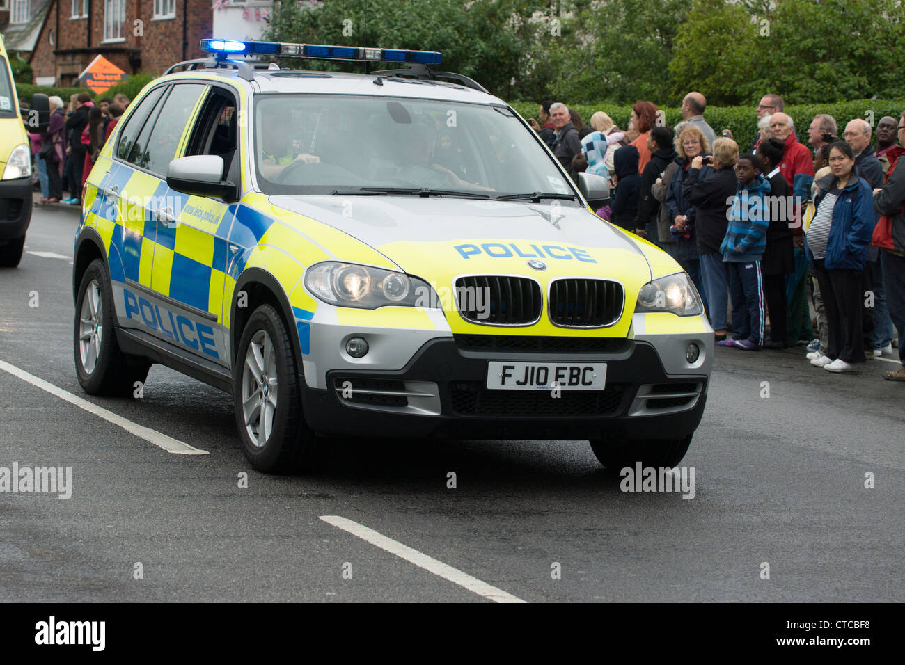 Police car escort of the Olympic relay, A6,Oadby, Leicester Stock Photo