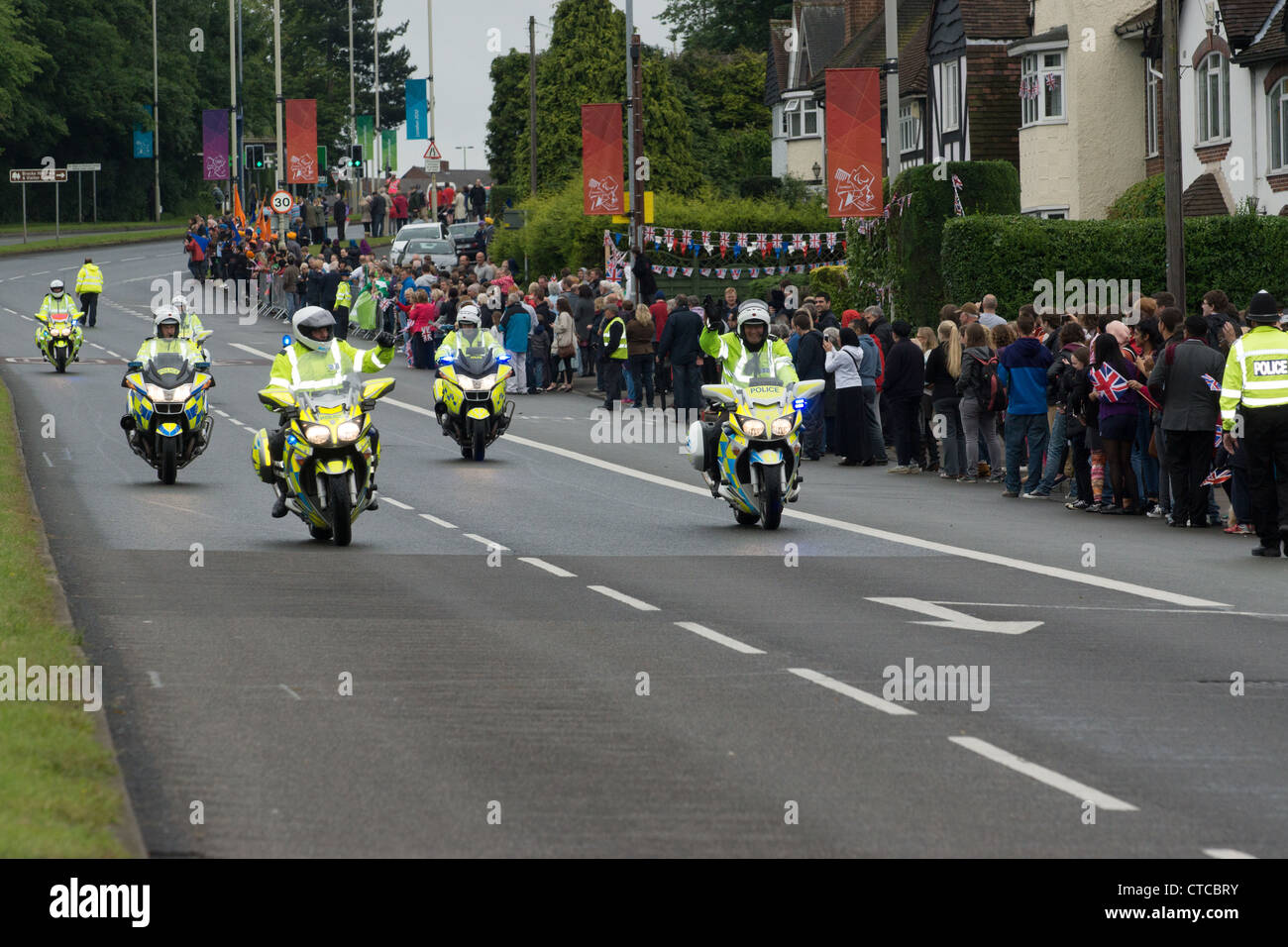 Police motorbikes escort of the Olympic relay, A6,Oadby, Leicester