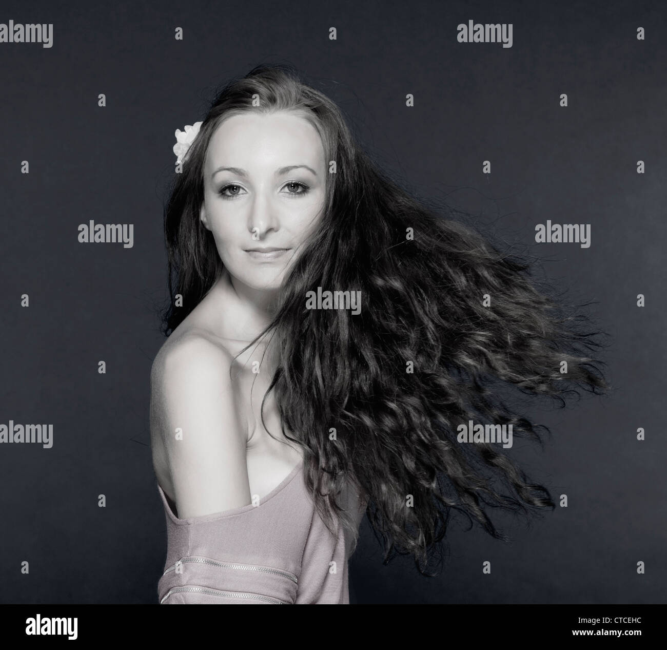 portrait of a young beautiful woman with long hair Stock Photo - Alamy