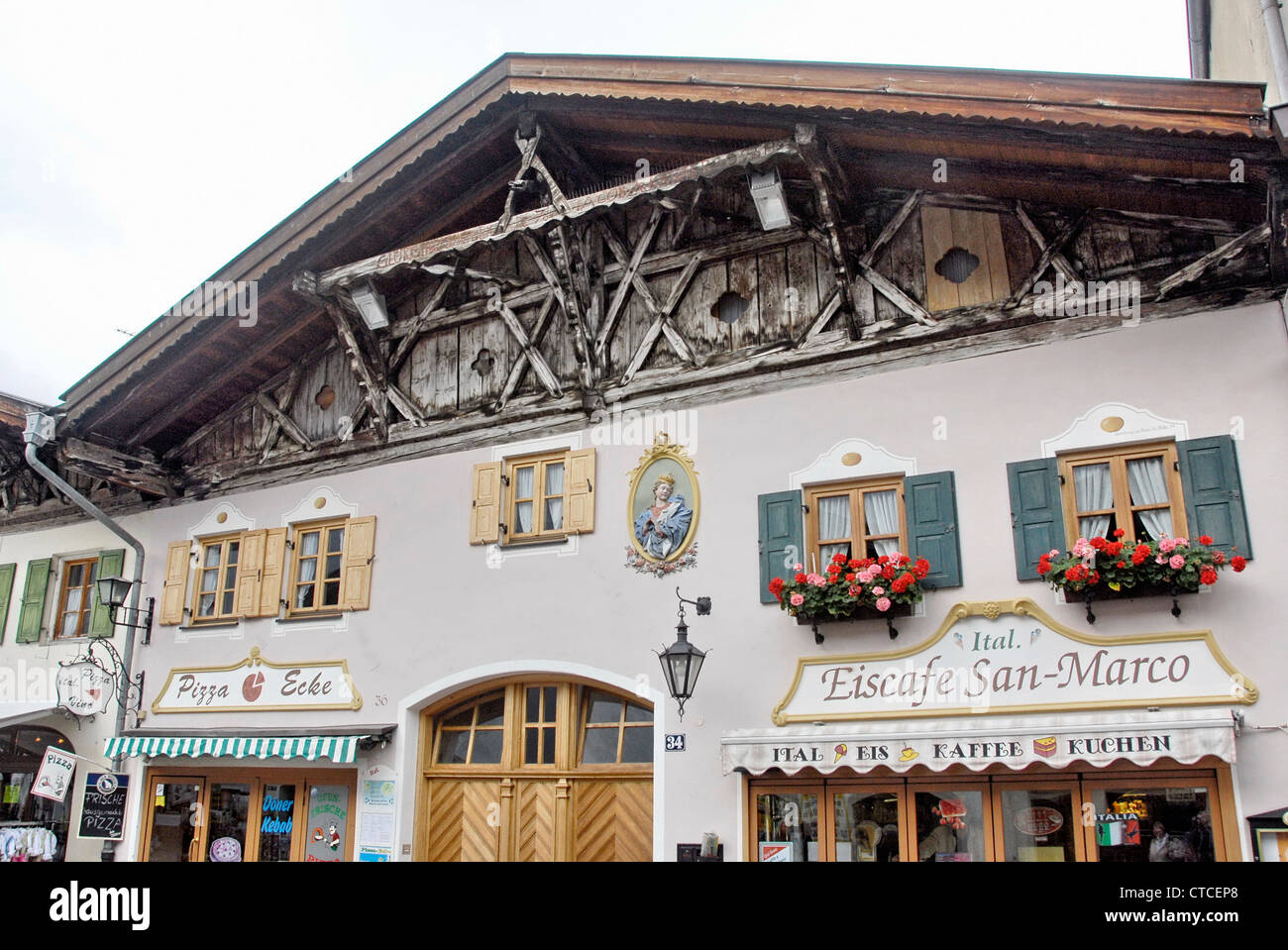 Painted facades with frescoes of typical houses in Mittenwald, Bavaria, Germany Stock Photo Alamy