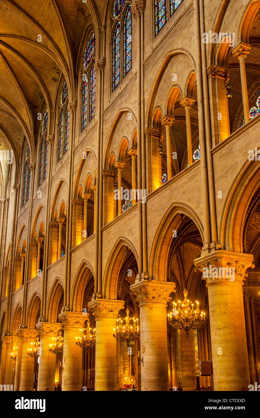 Rows of arched windows and column in the Interior of Cathedral Notre Dame, Paris, France Stock Photo