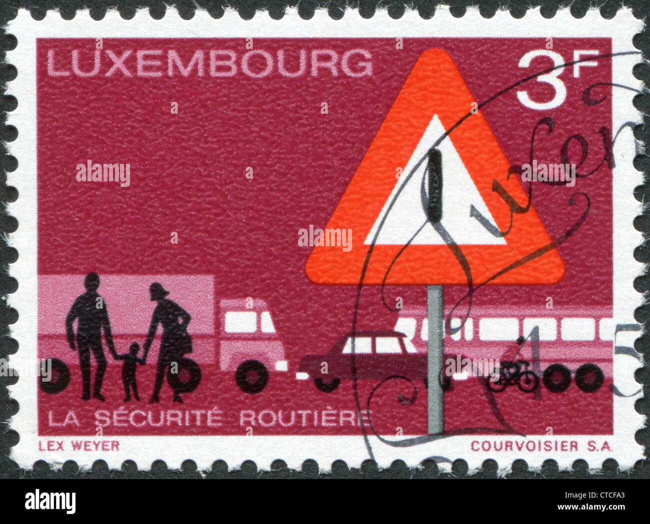 A stamp printed in Luxembourg, is dedicated to the importance of road safety shows Traffic Sign