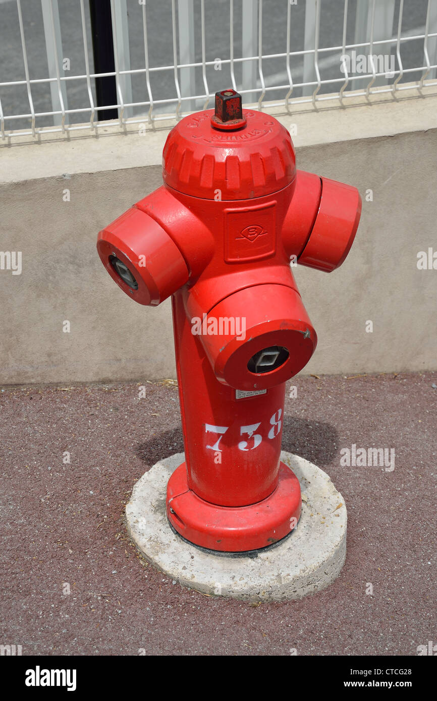 Fire hydrant on sidewalk in Grasse, Côte d'Azur, Alpes-Maritimes, Provence-Alpes-Côte d'Azur, France Stock Photo