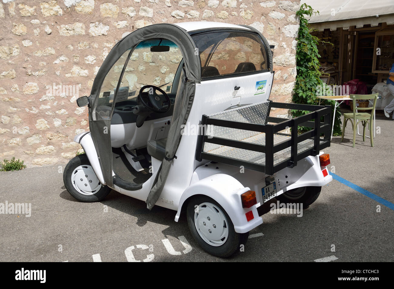 Small electric car in Gourdon, Côte d'Azur, Alpes-Maritimes, Provence-Alpes-Côte d'Azur, France Stock Photo