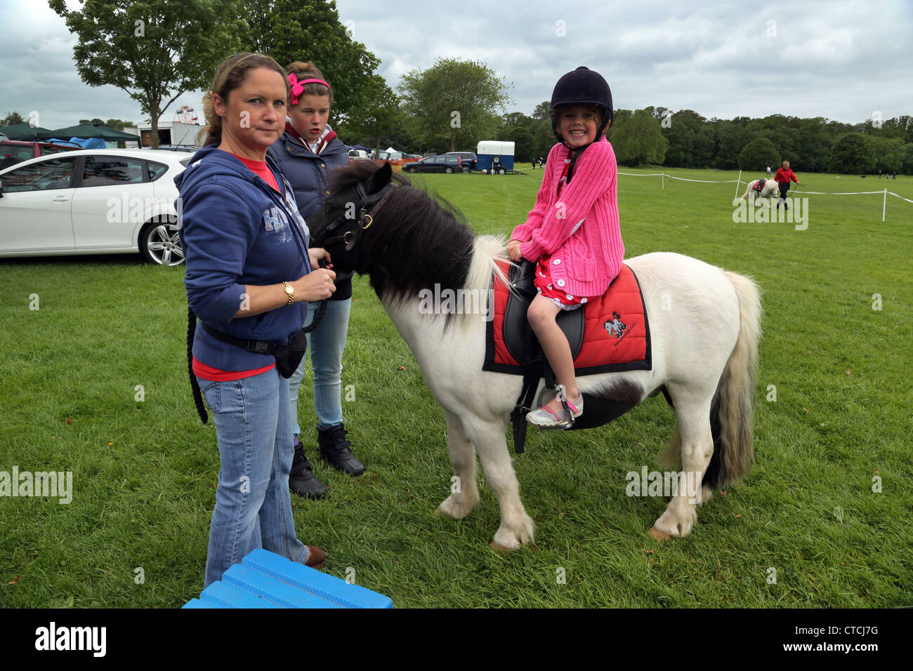 Pony Riding At Cheam Village Fair Surrey England Stock Photo Alamy