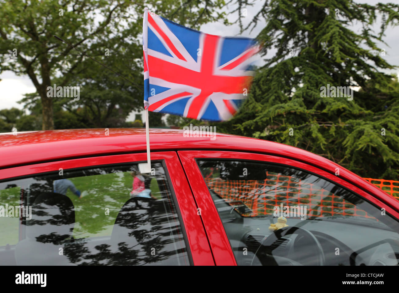 Car With Union Jack Flag On Window At Cheam Village Fair For Queen's