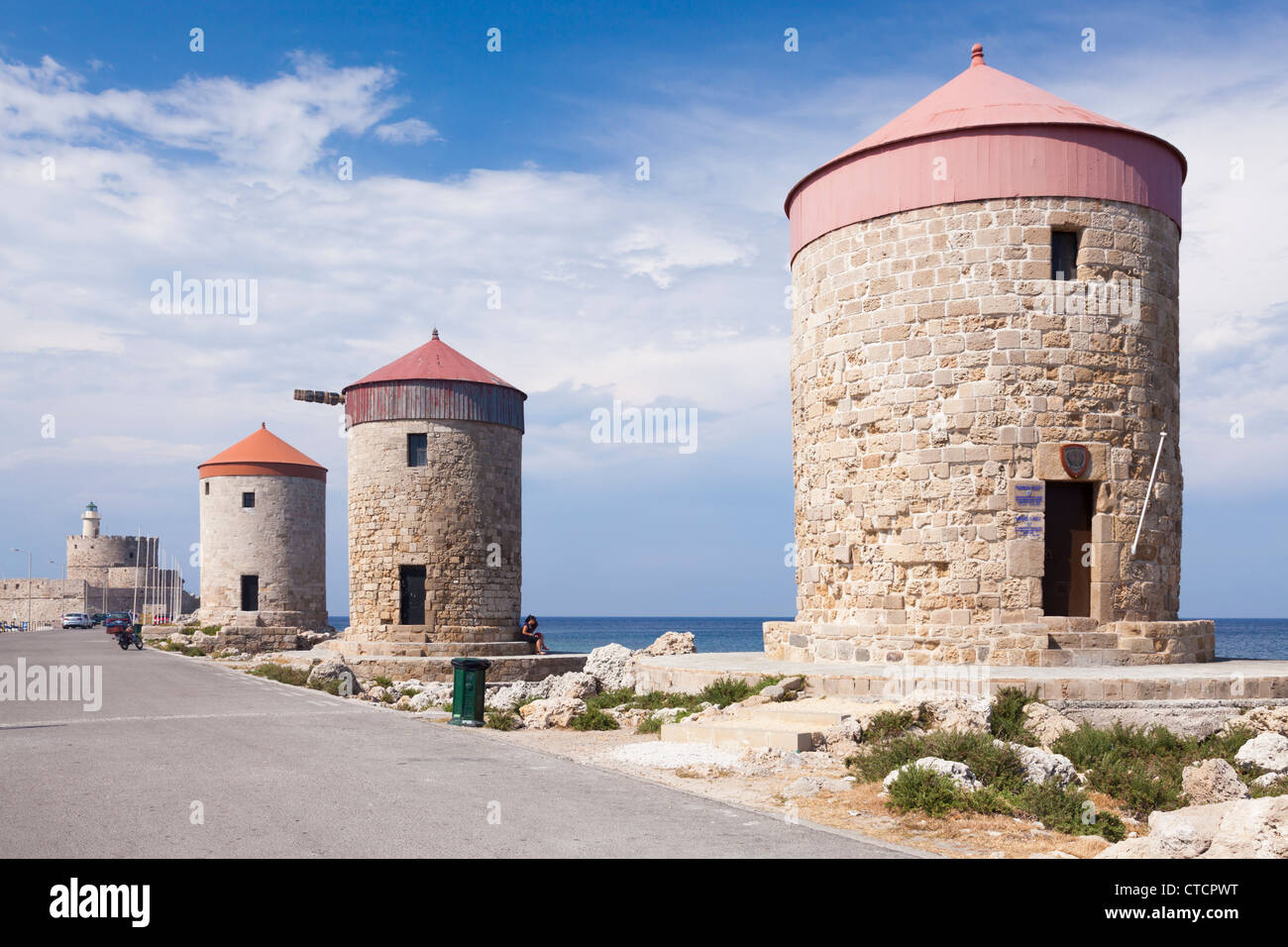 Mandraki Harbour windmills Island of Rhodes Greece Stock Photo