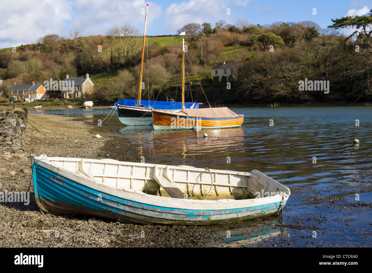 Boats moored at Coombe on the River Fal Cornwall England UK Stock Photo