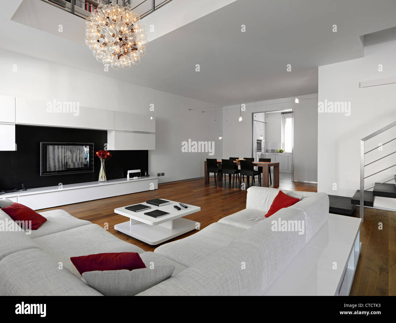 modern living room with sofa and dining table Stock Photo - Alamy