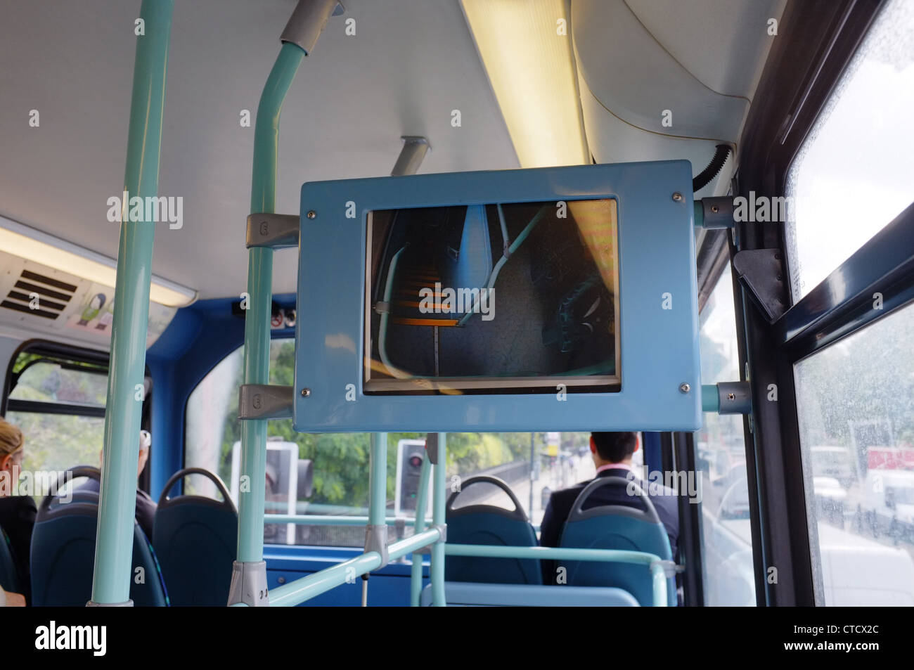 digital bus advertising screen, upstairs on a London bus Stock Photo