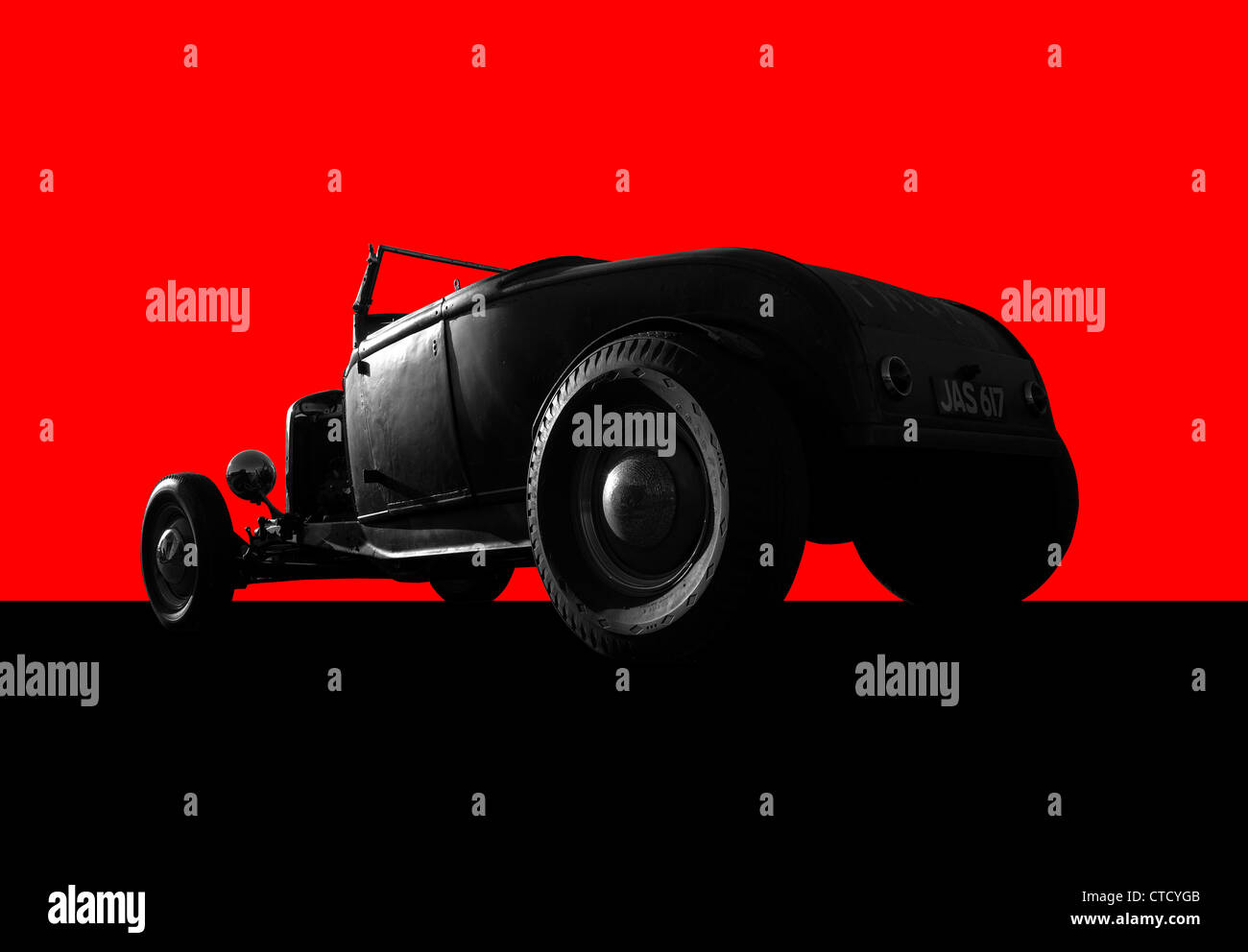 Cut-out image of hot rod car on red background Stock Photo