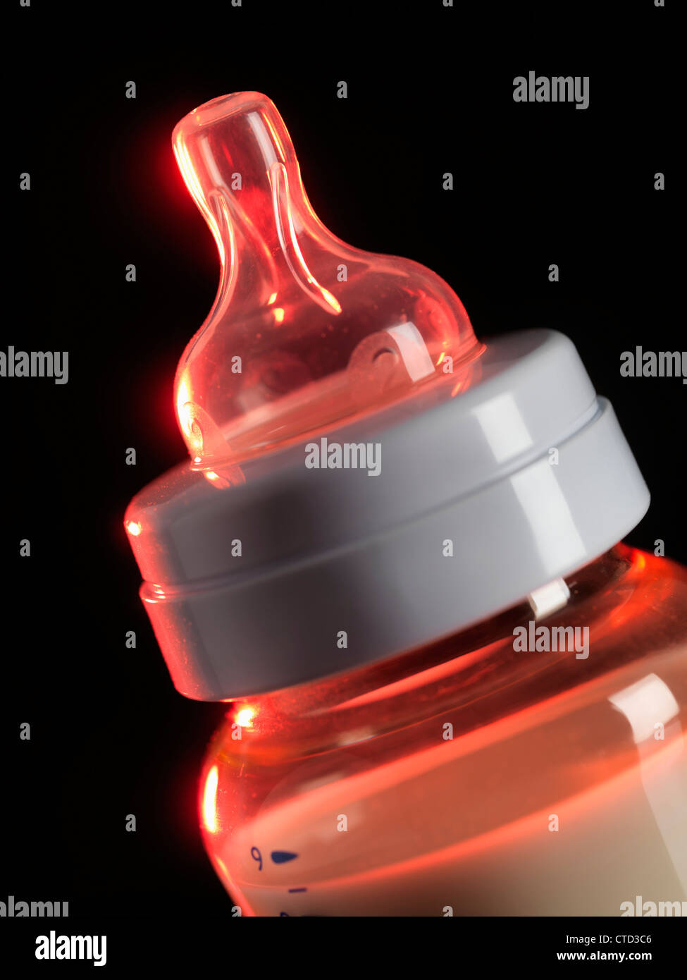 Heated baby's bottle Stock Photo Alamy