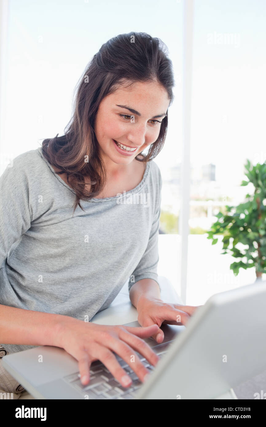 Personal Computer Student Beaming student using a personal computer Stock Photo - Alamy
