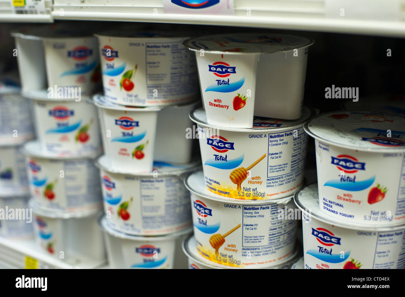 Yogurt Shelf In Supermarket High Resolution Stock Photography and