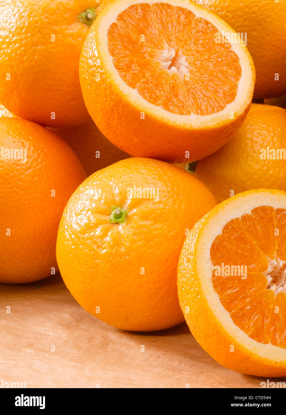 pile of open and closed fresh oranges Stock Photo Alamy