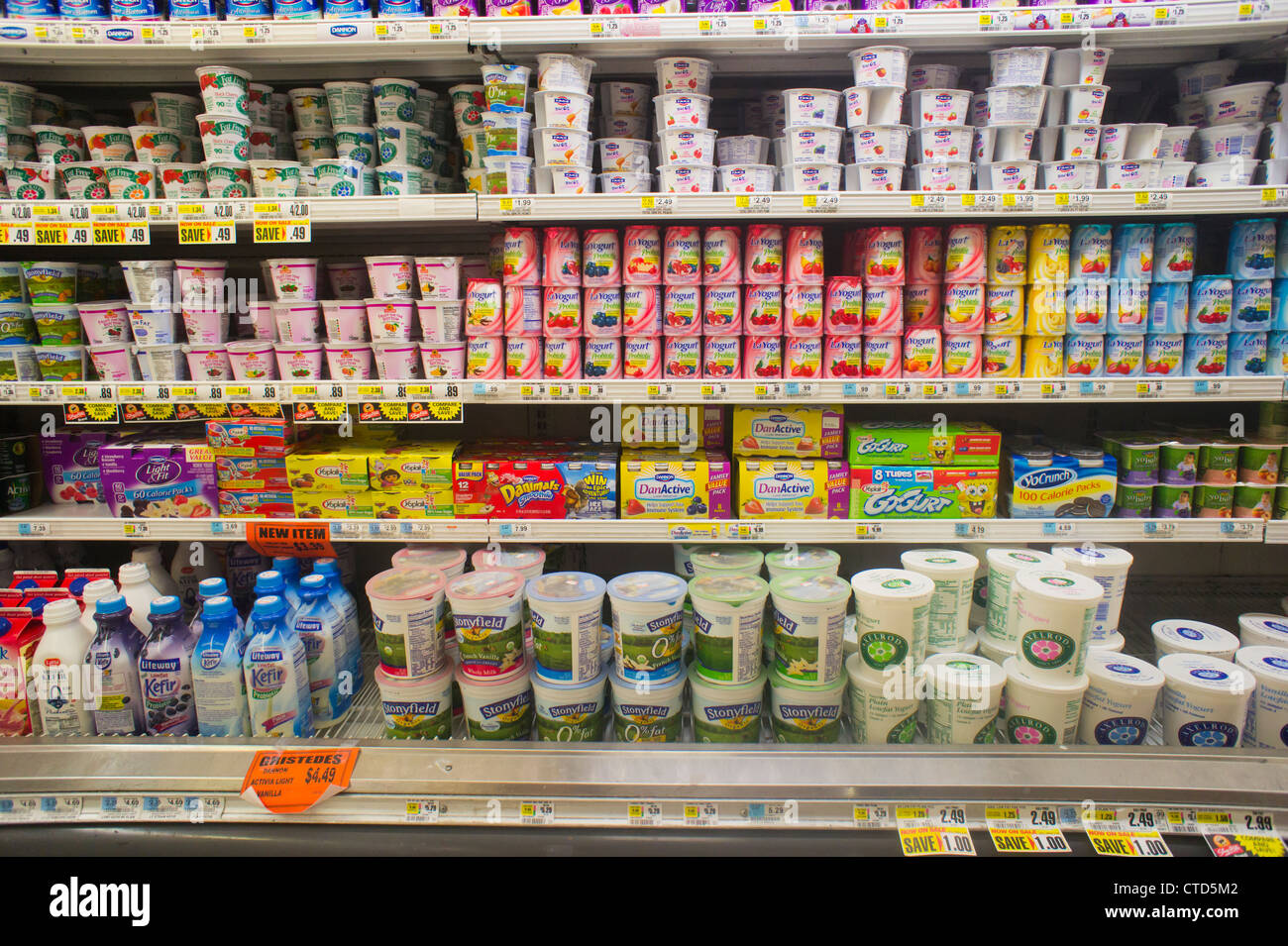 Selections of different brands of yogurt in the dairy department of a