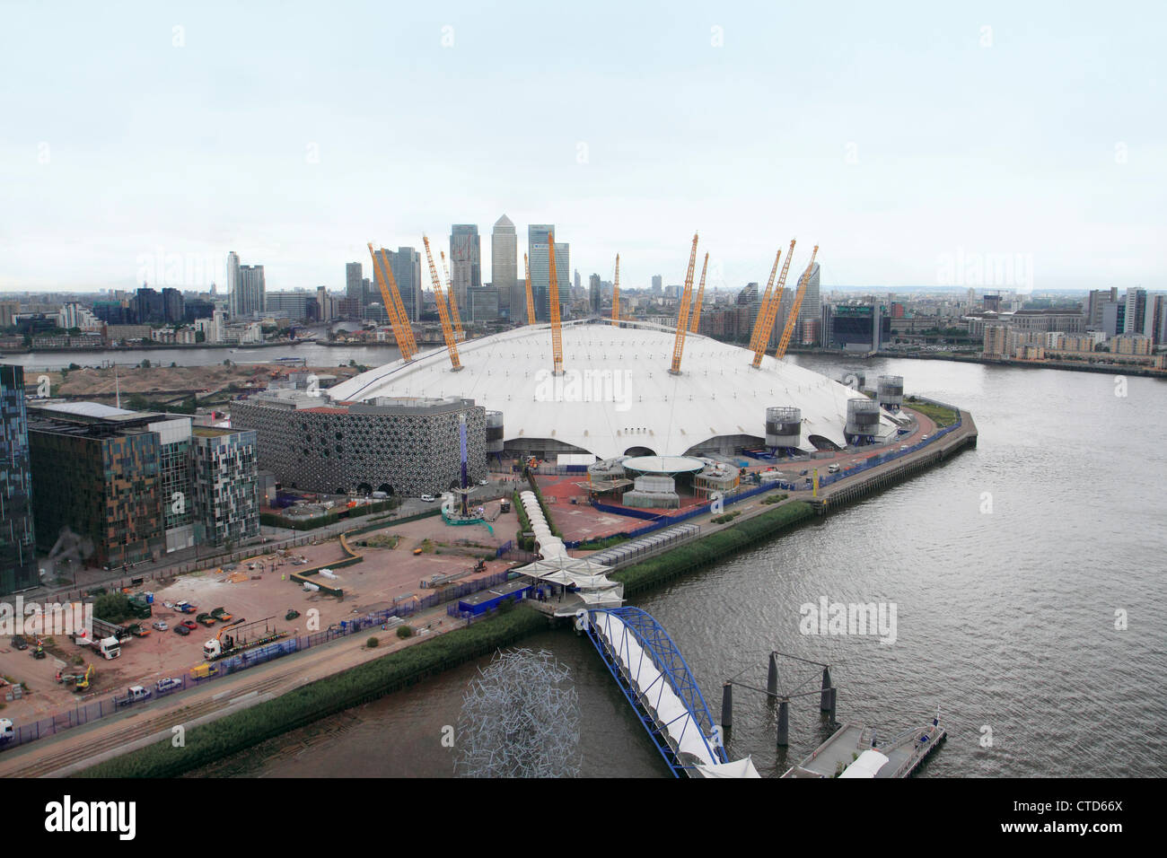 Aerial of O2 Arena on Greenwich Peninsula with Canary Wharf in background, London UK Stock Photo