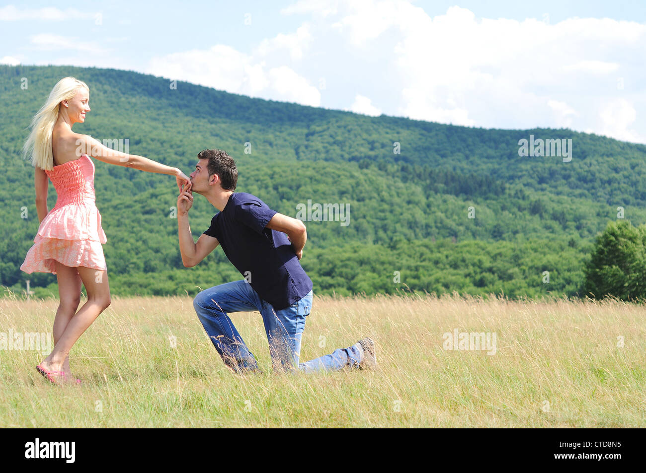 Boyfriend kiss girl hand in nature Stock Photo Alamy