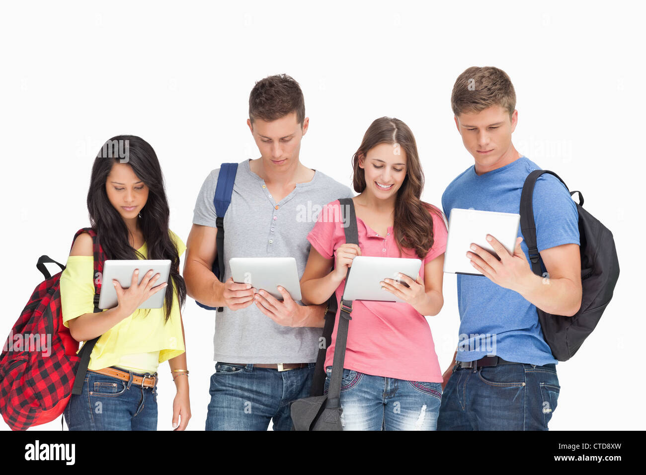 Students look at their. Студент с планшетом. Фотосессия студенты с планшетом. Группа людей с планшетами. Человек с планшетом в руках.