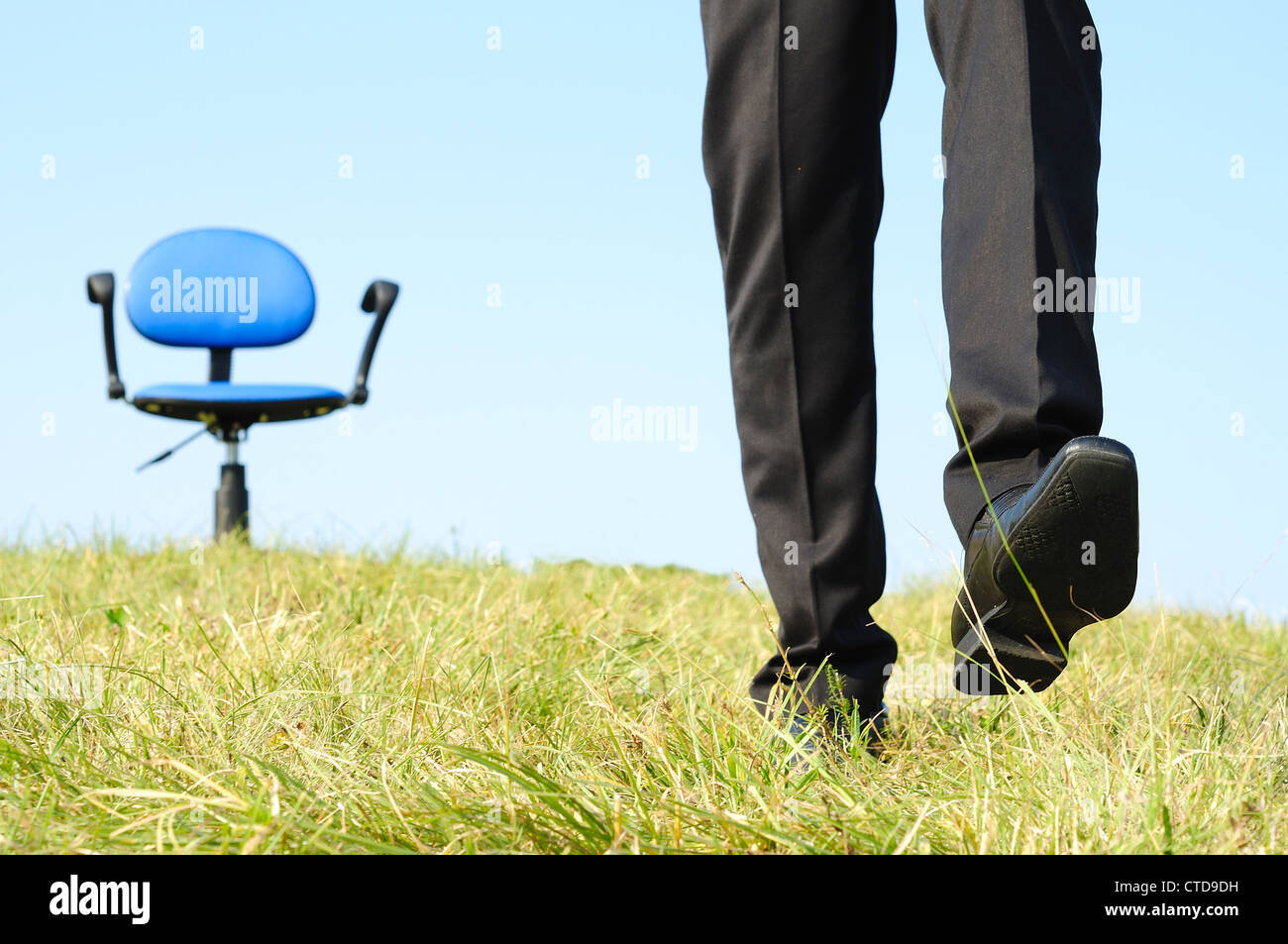 Business man leaving the seat Stock Photo Alamy